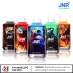 JNR Falcon disposable vapes in Sakura Grape, Cherry Lemon, Blue Razz Ice, Mango Passion Fruit, and Watermelon Mango Peach flavors, each with falcon artwork